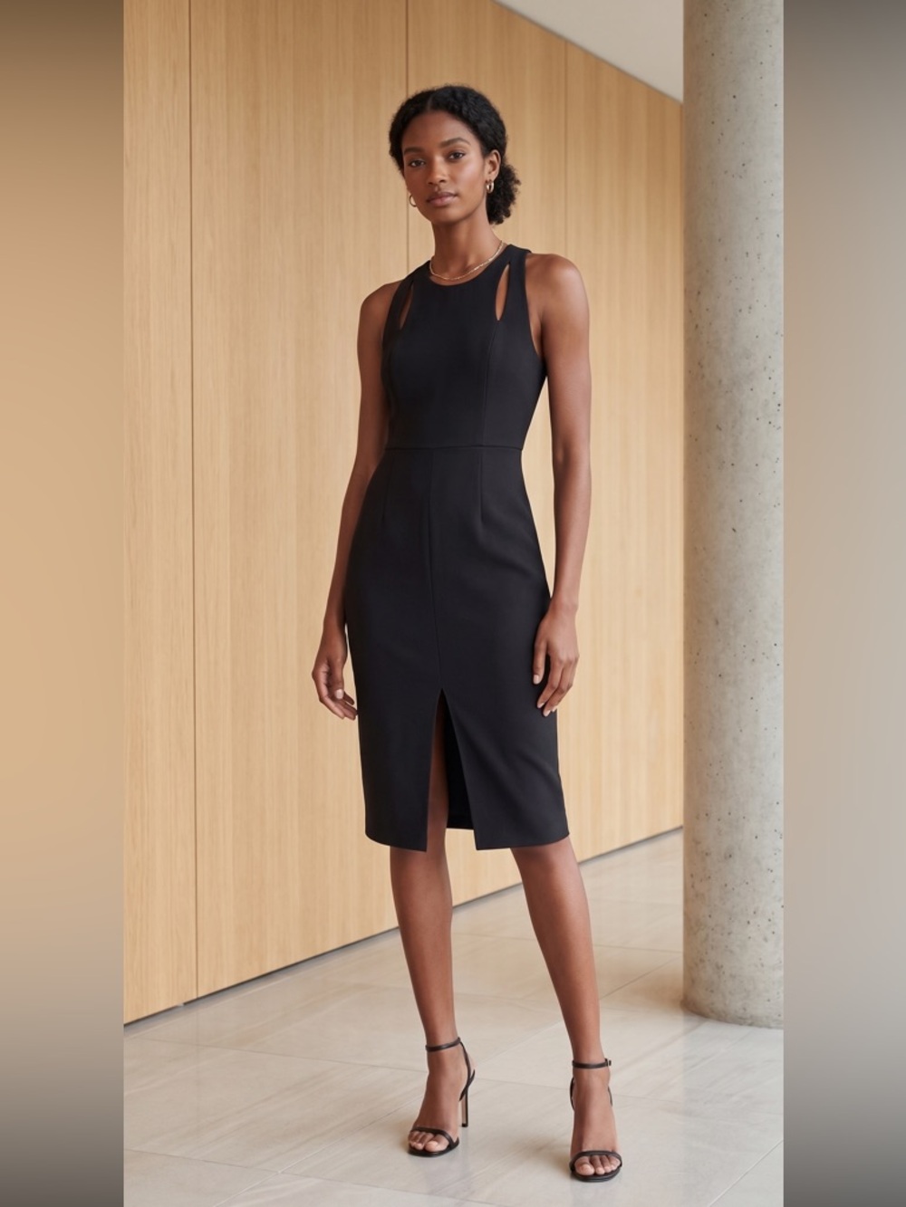 Express Black Body Con dress with cutouts and zipper on the back. LBD